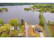 Stunning aerial view showcasing a modern home with a boat launch, highlighting lake access and community charm at 48 Paschal St, Temple, GA 30179