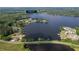 An aerial view shows the property at 48 Paschal Rd, Temple, GA near a scenic lake at 48 Paschal St, Temple, GA 30179