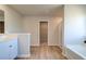 Bright bathroom features a tub, vanity, and walk-in closet at 5 Camellia Dr, Fairburn, GA 30213