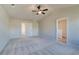 Spacious main bedroom with walk-in closet and vaulted ceiling at 5 Camellia Dr, Fairburn, GA 30213