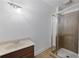 Bathroom with a shower featuring a glass door at 1206 Kincaid Rd, Marietta, GA 30066