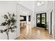 A luxurious foyer boasting hardwood floors, high ceilings, and sophisticated decor at 1206 Kincaid Rd, Marietta, GA 30066