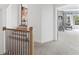 This hallway has carpeted floors and access to multiple rooms with lots of natural light at 1206 Kincaid Rd, Marietta, GA 30066