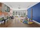 This playroom has hardwood flooring, unique wall art, and a large window providing natural light at 1206 Kincaid Rd, Marietta, GA 30066