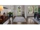 Bright foyer with hardwood floors, a stylish rug, and decorative accents at 3024 Malbec Vly, Acworth, GA 30101