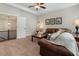 Inviting living room featuring a comfortable sofa and doorway leading to adjacent space at 3024 Malbec Vly, Acworth, GA 30101