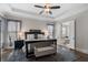 The main bedroom has a plush rug, ceiling fan and door leading to the bathroom at 3024 Malbec Vly, Acworth, GA 30101