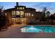 Backyard featuring a sparkling pool with lounge chairs and outdoor dining area, ideal for entertainment at 3024 Malbec Vly, Acworth, GA 30101