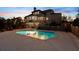 Serene backyard with a private pool, patio, and well-maintained landscaping perfect for outdoor entertainment at 3024 Malbec Vly, Acworth, GA 30101