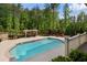 Inviting in-ground pool with an adjacent lounge area, perfect for relaxation and entertaining at 3024 Malbec Vly, Acworth, GA 30101