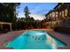 Beautiful backyard with a refreshing pool, pergola, and lounge chairs, great for summer relaxation and enjoyment at 3024 Malbec Vly, Acworth, GA 30101