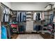 This walk-in closet has shelving and ample storage for your wardrobe at 3024 Malbec Vly, Acworth, GA 30101