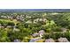 A sprawling residential area with golf course, mature trees and lush landscapes at 580 Grimsby Ct, Suwanee, GA 30024