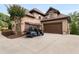 Attached two-car garage and golf cart at 580 Grimsby Ct, Suwanee, GA 30024