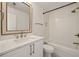 Bright bathroom includes a combination shower and tub, complemented by a stylish vanity at 6355 Glen Oaks Ln, Atlanta, GA 30328
