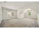 Bright and airy bedroom features two large windows and neutral carpeting at 6355 Glen Oaks Ln, Atlanta, GA 30328