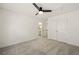 Clean bedroom with plush carpeting, white walls, and access to an ensuite bathroom and closet at 6355 Glen Oaks Ln, Atlanta, GA 30328