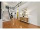 Elegant foyer featuring hardwood floors, a staircase, and stylish accents, creating a welcoming entrance at 6355 Glen Oaks Ln, Atlanta, GA 30328