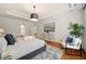 Main bedroom showcases a tray ceiling, large windows, and plenty of room to relax at 6355 Glen Oaks Ln, Atlanta, GA 30328