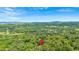 An aerial view shows the property is situated within a lush, forested neighborhood at 11 Headden Nw Rdg, Cartersville, GA 30121