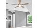 Spacious bedroom featuring a modern ceiling fan, light grey walls, and large windows at 11 Headden Nw Rdg, Cartersville, GA 30121