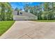 Spacious driveway leading to the white garage, complemented by a well-manicured lawn at 11 Headden Nw Rdg, Cartersville, GA 30121