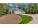 Beautiful home with a three car garage and long driveway in wooded setting at 11 Headden Nw Rdg, Cartersville, GA 30121