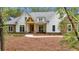 Charming new construction home with stone accents, wood porch, and manicured landscaping at 11 Headden Nw Rdg, Cartersville, GA 30121