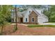 Beautiful home with attached two car garage, stone accents, and manicured landscaping at 11 Headden Nw Rdg, Cartersville, GA 30121