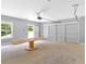 Interior view of a spacious garage with a door and window, offering potential for various uses at 11 Headden Nw Rdg, Cartersville, GA 30121