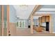 Spacious living area featuring timber beams, trim, and French doors at 11 Headden Nw Rdg, Cartersville, GA 30121
