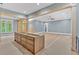 Spacious area for the kitchen with exposed beams and large windows at 11 Headden Nw Rdg, Cartersville, GA 30121
