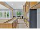 Bright kitchen featuring unfinished custom cabinetry and scenic backyard view at 11 Headden Nw Rdg, Cartersville, GA 30121