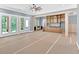 Spacious living area featuring trim, timber beams, and french door access to backyard at 11 Headden Nw Rdg, Cartersville, GA 30121