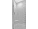 Modern shower featuring glass doors, ceramic tile, a built-in seat, and a rainfall shower head at 11 Headden Nw Rdg, Cartersville, GA 30121