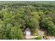 An aerial view of a home nestled in a lush, green landscape at 1519 Brookcliff Cir, Marietta, GA 30062