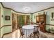 Charming breakfast nook with large windows offering picturesque views of the surrounding greenery at 1519 Brookcliff Cir, Marietta, GA 30062