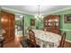 Inviting dining room with hardwood floors, a classic china cabinet, and traditional decor at 1519 Brookcliff Cir, Marietta, GA 30062