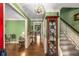 Bright foyer with hardwood floors, staircase, and elegant decor, leading to the rest of the home at 1519 Brookcliff Cir, Marietta, GA 30062