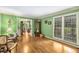 Spacious living room with hardwood floors, large windows, and comfortable seating area at 1519 Brookcliff Cir, Marietta, GA 30062