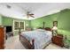 Relaxing main bedroom with a ceiling fan and soft carpet at 1519 Brookcliff Cir, Marietta, GA 30062