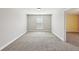 Bright bedroom featuring neutral paint, carpet flooring, and a window at 3750 Thackary Dr, Powder Springs, GA 30127
