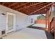 Outdoor patio featuring a door, window, and stairs at 3750 Thackary Dr, Powder Springs, GA 30127
