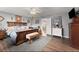 Cozy main bedroom with hardwood floors, ceiling fan, attractive artwork and a walk-in closet at 6045 Mockingbird Rd, Cumming, GA 30028