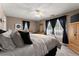 Comfortable bedroom with large windows and plenty of natural light at 6045 Mockingbird Rd, Cumming, GA 30028