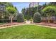 Beautifully maintained green space with manicured lawn and landscaping, ideal for outdoor enjoyment at 700 Park Regency Ne Pl # 1407, Atlanta, GA 30326