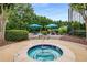 Relaxing hot tub surrounded by greenery and seating, offering a peaceful retreat within the community at 700 Park Regency Ne Pl # 1407, Atlanta, GA 30326
