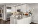 This modern kitchen features stainless appliances, granite counters and pendant lighting at 700 Park Regency Ne Pl # 1407, Atlanta, GA 30326