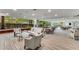 Lounge area with lots of light, comfortable seating and tables perfect for conversation and relaxation at 700 Park Regency Ne Pl # 1407, Atlanta, GA 30326
