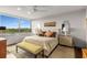 The spacious main bedroom offers great views with an abundance of natural light at 700 Park Regency Ne Pl # 1407, Atlanta, GA 30326